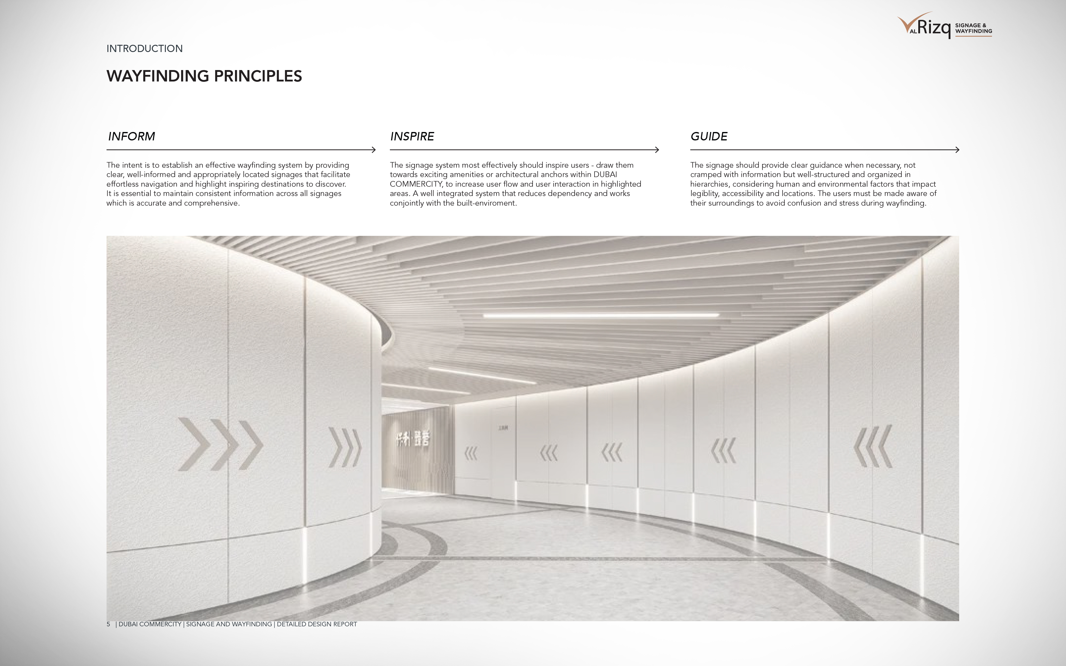 Wayfinding principles: a curved corridor with directional chevrons guiding movement